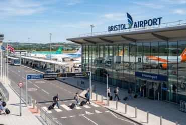 Bristol Airport terminal and Transport Interchange with passengers travelling through the airport